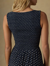 Load image into Gallery viewer, Faherty Sophia Smocked Dress in Navy Lotus Floral