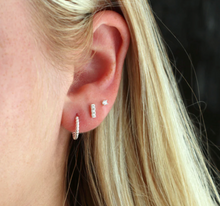 Load image into Gallery viewer, Kris Nations Twisted Hinged Huggie Hoop Earrings in Sterling Silver